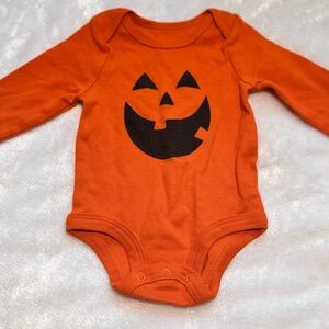 Orange Pumpkin Face Baby Onesie